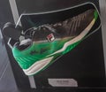 John Isner`s autographed tennis shoes on display at the Rafa Nadal Museum