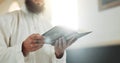 Islam, prayer and man in mosque with Quran, mindfulness and gratitude in faith reading in peace. Worship, religion and Royalty Free Stock Photo