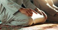 Islam, prayer and men in mosque on knees, mindfulness and gratitude in faith, love and commitment. Worship, religion and Royalty Free Stock Photo