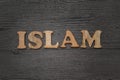 Islam title text word. Wooden alphabet letter blocks