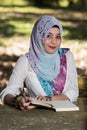 Islam woman write diary Royalty Free Stock Photo