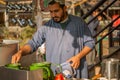 A man making a tea at tea stall in a winter morning