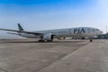 PIA, Pakistan International Airlines Boeing 777 parked on apron of Islamabad International Airport