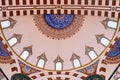 Islamic art decoration at the Sehzade Mosque in Istanbul, Turkey. Interior view of the main dome. Royalty Free Stock Photo