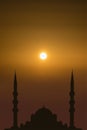Silhouette islamic mosque on sunrise sky background