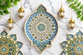 Islamic decorative plate with lanterns on marble Royalty Free Stock Photo