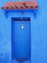 Islamic eave over door in african Chefchaouen town, Morocco - vertical Royalty Free Stock Photo