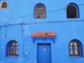 Islamic elevation with eave over door in Chefchaouen town, Morocco Royalty Free Stock Photo