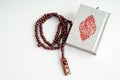 Islamic Holy Book Quran with prayer beads Royalty Free Stock Photo