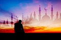 Islamic man praying Muslim Prayer in Twilight time