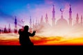 Islamic man praying Muslim Prayer in Twilight time Royalty Free Stock Photo