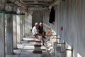 Islamic men washing their feet