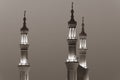 Islamic mosque spires in black and white echos prayer calls at night. Muslim, ramadan, religion concepts