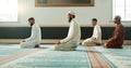 Islamic, praying and holy men in a Mosque for spiritual religion together as a group to worship Allah in Ramadan. Muslim Royalty Free Stock Photo