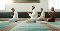 Islamic, praying and holy men in a Mosque for spiritual religion together as a group to worship Allah in Ramadan. Muslim Royalty Free Stock Photo