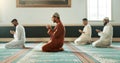 Islamic, praying and holy men in a Mosque for spiritual religion together as a group to worship Allah in Ramadan. Muslim Royalty Free Stock Photo