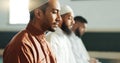 Islamic, praying and men in a Mosque for spiritual religion together as a group to worship Allah in Ramadan. Muslim Royalty Free Stock Photo