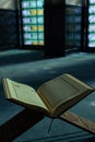 Islamic or ramadan background vertical photo. The Holy Quran on the book stand