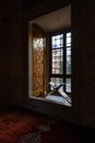 Islamic or ramadan concept photo. A lectern in front of a window of a mosque