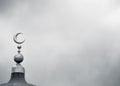 Islamic symbol on mosque in overcast weather