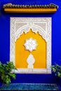 Islamic window in yellow and blue Royalty Free Stock Photo
