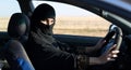 Islamic woman taxi driver driving a car