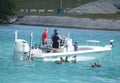Islamorada, Florida - February 22, 2022 - A family fishing on a boat by the bay