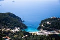 Island aerial view blue ocean behind. Beautiful Greek landscape. Corfu Greece natural places. Mountain next to sea water. Gorgeous Royalty Free Stock Photo