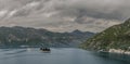 island with church and mountains in Kotor panorama