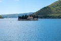 Island on coastal side of Kotor on sunny day. Kotor,Montenegro