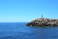 Nautical sign on a small rocky island in the Mediterranean.