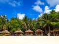 Island Huts Lining Tropical Beach Royalty Free Stock Photo