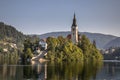 Island in lake Bled in foggy morning light Royalty Free Stock Photo