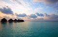 Island in ocean, Maldives . Villa on piles on wate Royalty Free Stock Photo