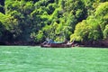 Island, Ocean views near Phuket Thailand with Blues, Turquoise and Greens oceans, mountains, boats, caves, trees resort island of