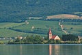 The island with the old church in the middle of the lake. Landscape under Palava. Czech Republic - South Moravian Region wine