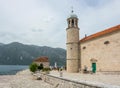 The island of Our Lady Gospa od Skrpjela on the reef is located near Perast Royalty Free Stock Photo