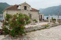 The island of Our Lady Gospa od Skrpjela on the reef is located near Perast Royalty Free Stock Photo