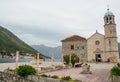 The island of Our Lady Gospa od Skrpjela on the reef is located near Perast Royalty Free Stock Photo