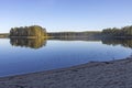 An island overgrown with trees on Lake Onega Royalty Free Stock Photo