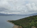 Island in the sea and cloudy sky. View of Fethiye from the Kizil Ada island.