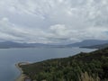 Island in the sea and cloudy sky. View of Fethiye from the Kizil Ada island.