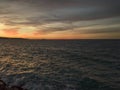 Island of Stromboli. Volcano seen at sunset from the Calabrian coast. Italy