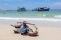 Lady sale food from her carry at beach typical in Thailand style Royalty Free Stock Photo