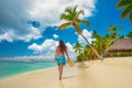 Island in the tropics. Happy walking girl enjoying tropical sandy beach, Saona island, Dominican Republic Royalty Free Stock Photo