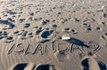 ISLANDA handwriting on black sand beach, Iceland Royalty Free Stock Photo