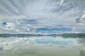 The Islands and mountains on reservior in dam. On the day of clouds and cloud reflection in the beautiful water of  KaengKrachan Royalty Free Stock Photo