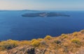 The islands of  Nea Kameni and Palea Kameni in Santorini`s caldera viewed from Skaros Rock Royalty Free Stock Photo