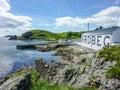 Islay, Scotland - Sseptember 11 2015: The sun shines on Ardbeg distillery warehouse