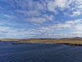 The Isle of Bressay seen from a Vessel heading out into the North Sea,